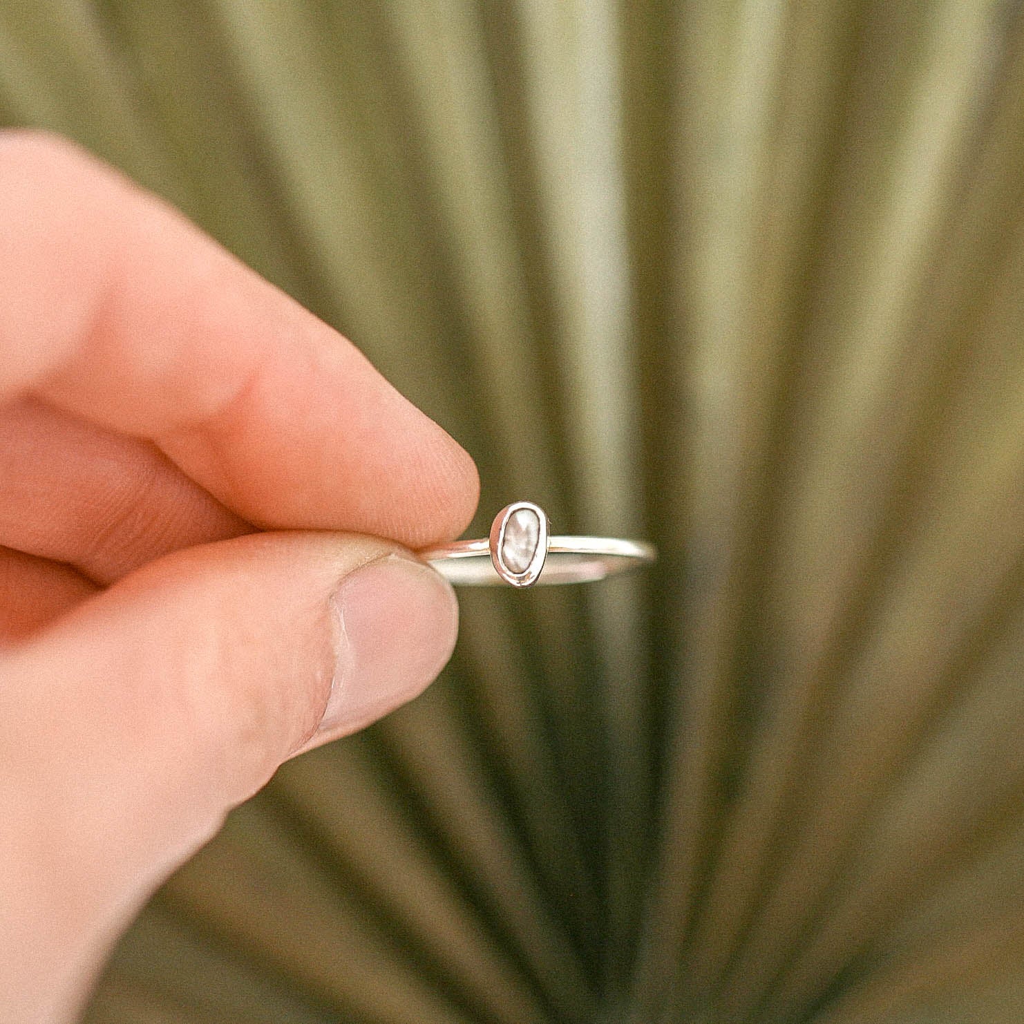 Tiny pearl ring