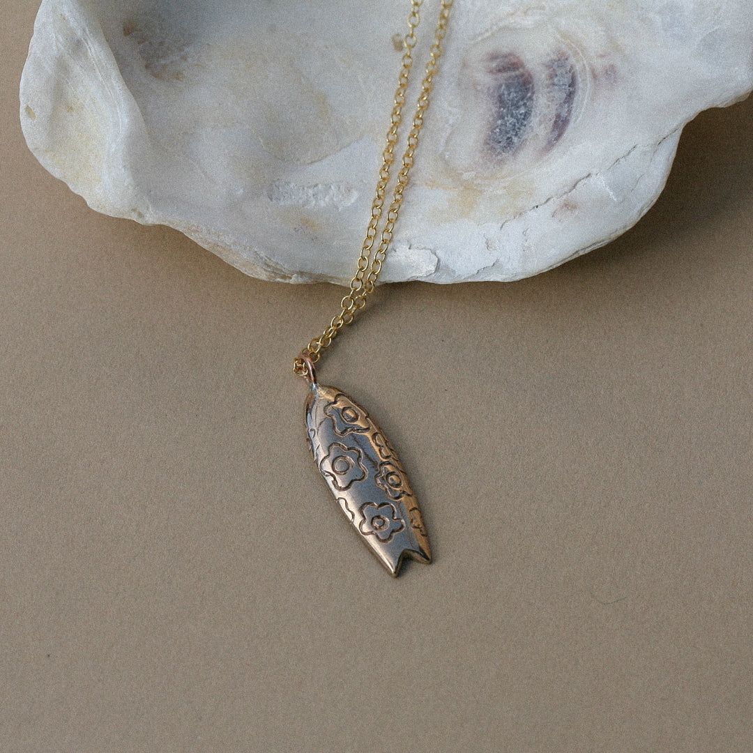 Collier planche de surf fleurs