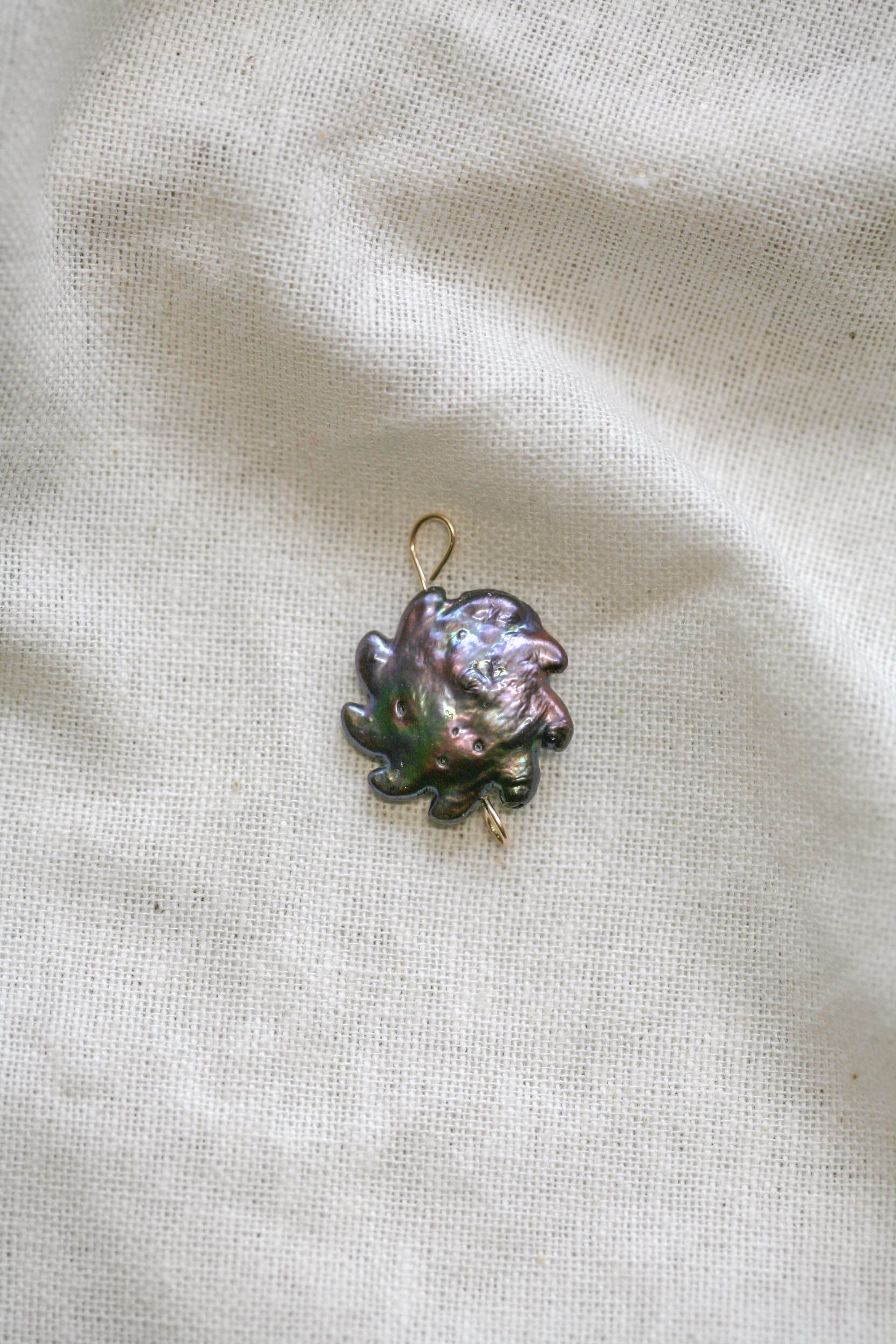 Sun pearl charm