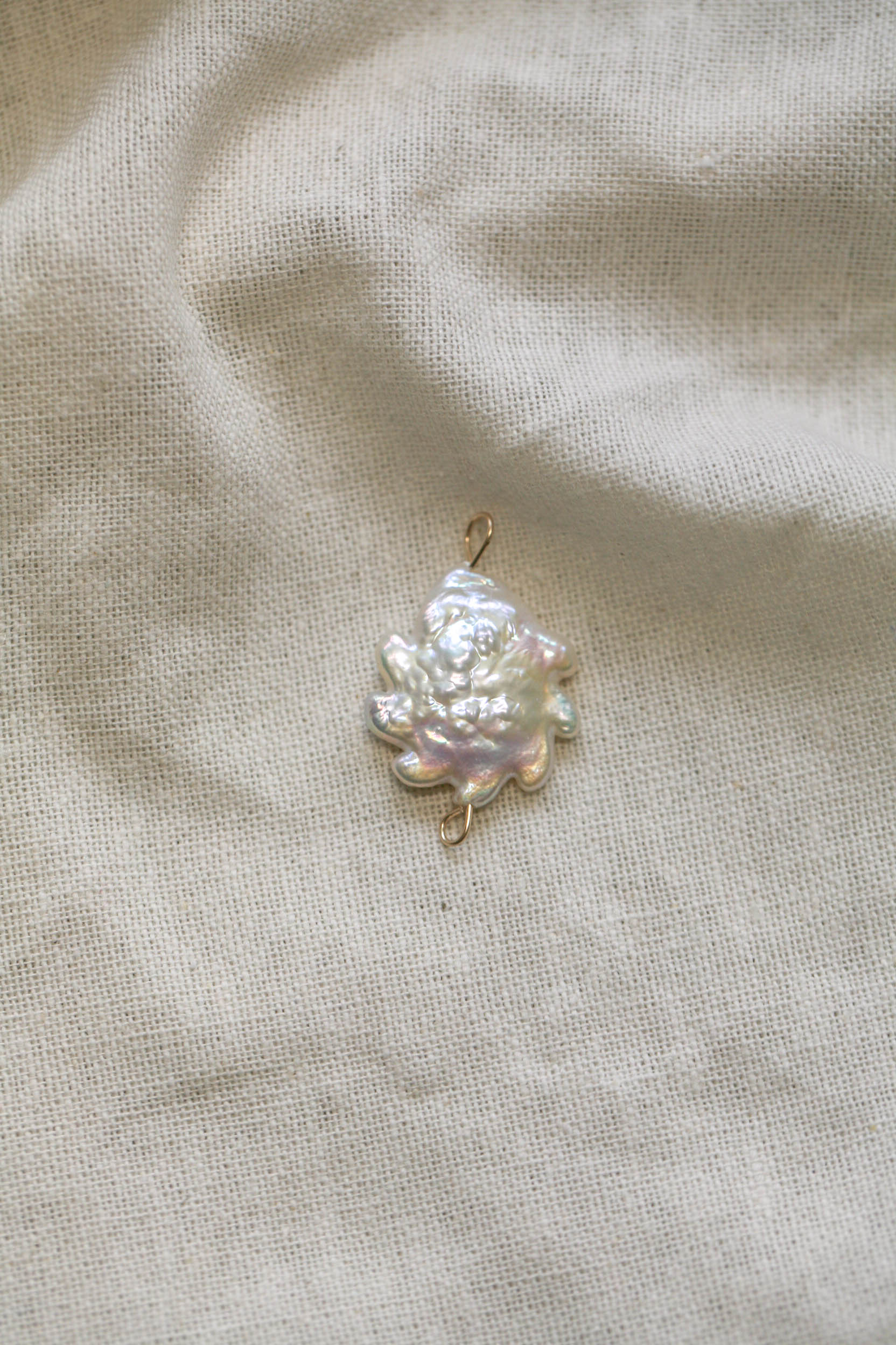 Sun pearl charm