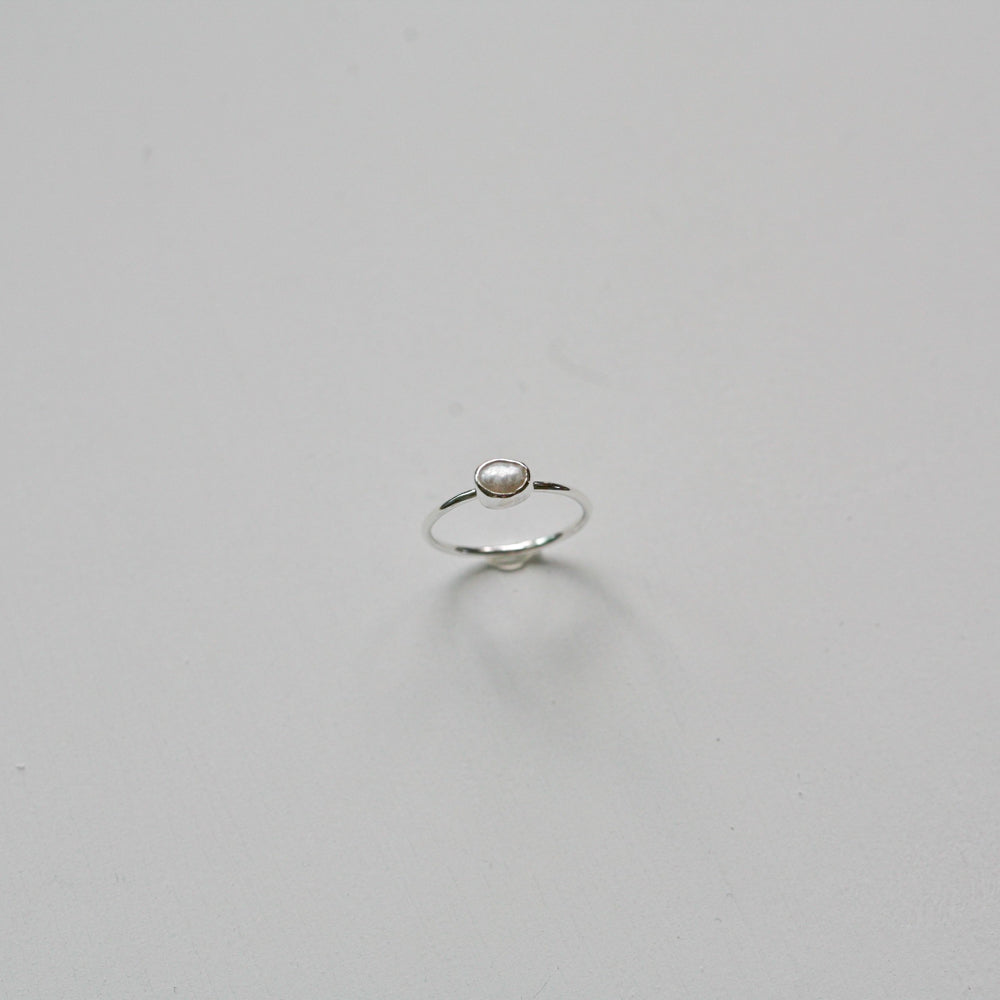Tiny pearl ring