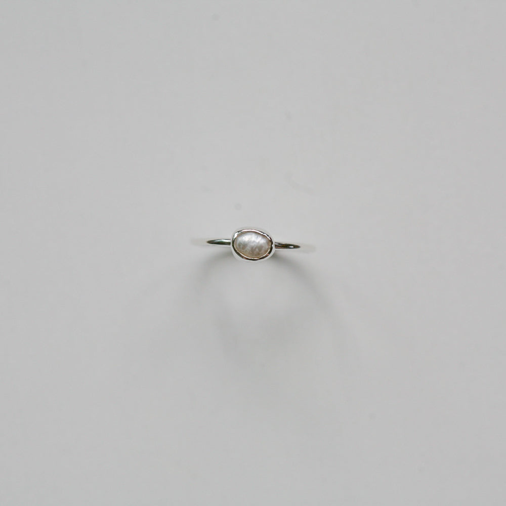 Tiny pearl ring